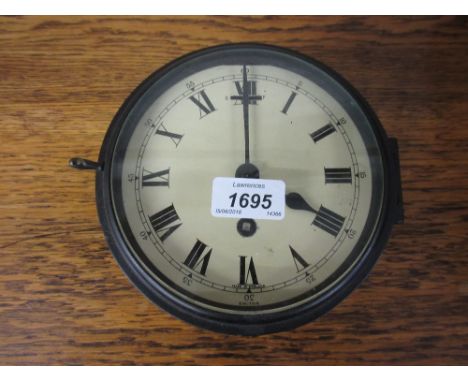 Ship's bulkhead clock (lacking case) with single train movement, the dial inscribed Smiths, an oak cased two train mantel clo
