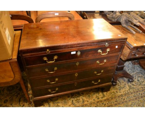 George III mahogany dwarf chest, the moulded top with brushing slide above four graduated drawers with brass swan neck handle