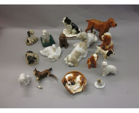 Royal Doulton figure of a dog in a basket, Beswick figure of a Red Setter, another of a Spaniel, two Nao figures of dogs, Nao