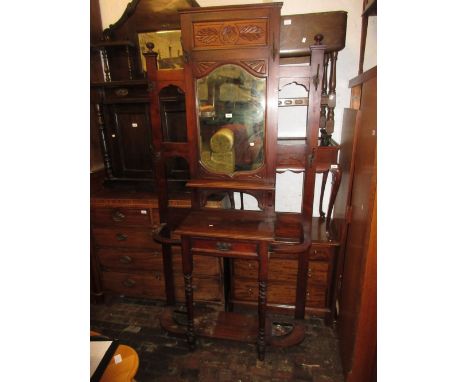 Large Victorian walnut hall stand having carved and mirrored back with various hooks, single glove drawer and two umbrella / 
