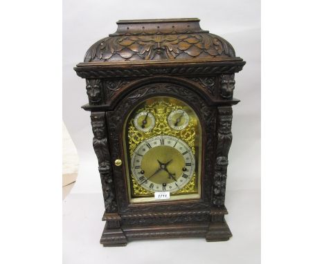 Large 19th Century German carved oak bracket clock, the gilded and silvered dial with Roman and Arabic numerals, subsidiary c