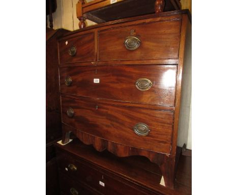 Small early 19th Century mahogany bow front chest of two short and two long drawers with oval brass handles and bracket feet