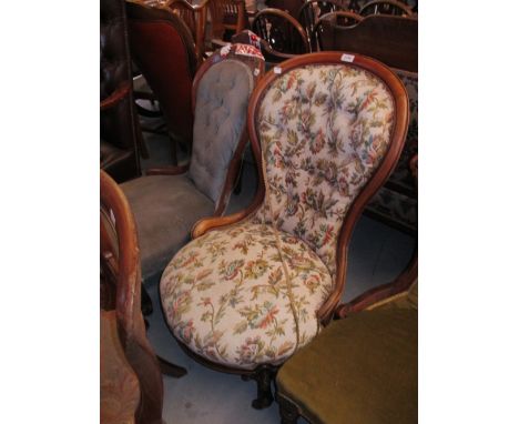 Victorian mahogany and button upholstered low seat nursing chair on carved cabriole front supports