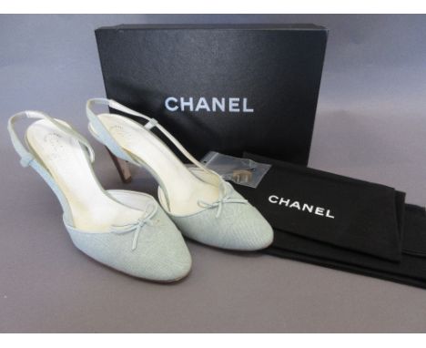Pair of ladies Chanel light blue canvas sling back shoes, size 40, with original dust bags and box