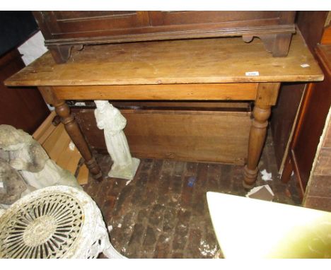 Small polished beech and pine rectangular farmhouse kitchen table with five stick back kitchen chairs and a farmhouse elbow c