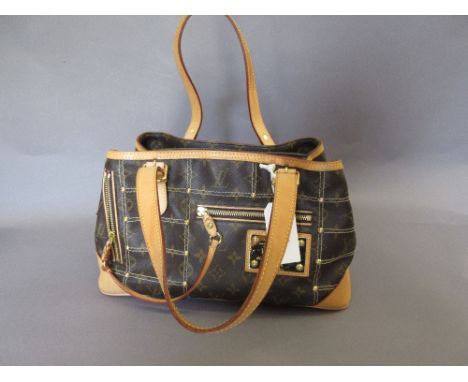 Louis Vuitton light brown leather and monogrammed ladies handbag