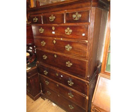 19th Century chest on chest, the moulded top above three short drawers and three long drawers flanked by reeded canted corner