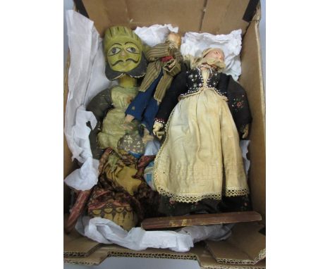 Indonesian painted wooden puppet and two other dolls