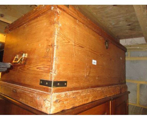 Rectangular polished pine trunk with brass side handles, together with a nest of three oak occasional tables and a nest of re