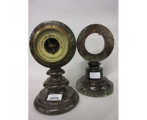 Serpentine cased aneroid barometer together with a similar serpentine clock case and a small table lamp