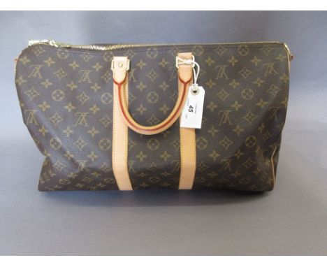 Louis Vuitton light brown leather and monogrammed holdall type bag