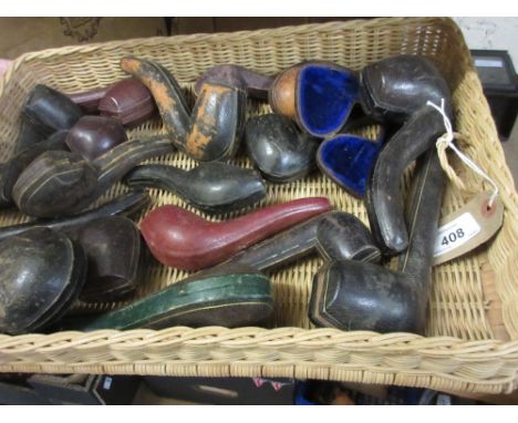 Wicker tray containing a quantity of various 19th Century leather pipe cases