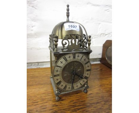 20th Century brass miniature lantern clock with single train carriage type movement