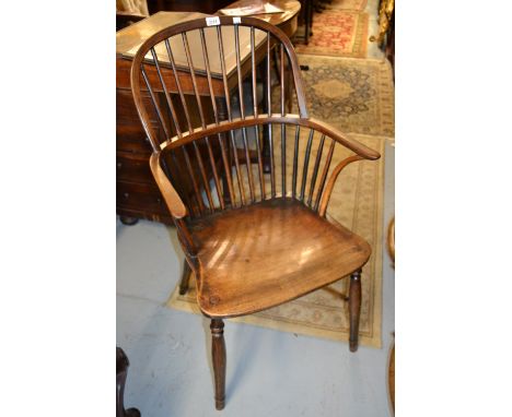 19th Century elm, fruitwood and beech Windsor chair, the hoop and stick back above a panel seat on turned supports with crino