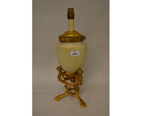 20th Century onyx and ormolu table lamp on three figural and hoof supports