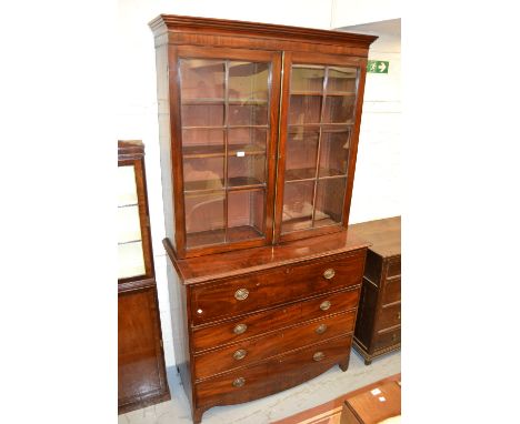 George III mahogany secretaire bookcase, the moulded cornice above a pair of astragal glazed doors, the base with a fitted se