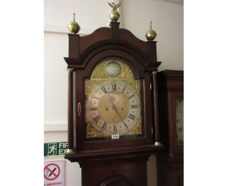 George III mahogany longcase clock, the broken arch hood above a moulded figured panelled door and conforming plinth base, th