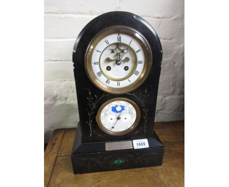 19th Century black marble mantel clock, the circular dial with Roman numerals and visible escapement with two train movement 