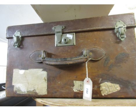Small leather travel trunk with inner tray
