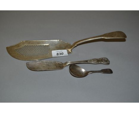 Late Georgian silver Fiddle pattern fish slice, a similar caddy spoon and a Victorian silver Kings pattern butter knife