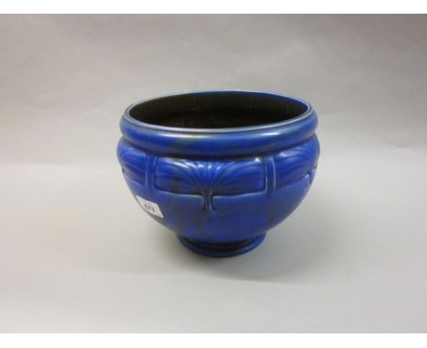 Bretby Art Deco relief moulded pottery jardiniere on blue ground