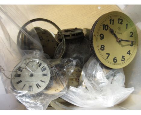 Small box containing a quantity of various pocket watch movements and parts, including various clock parts with a longcase cl