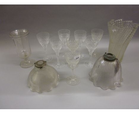 Set of eight Waterford type hobnail cut glass drinking glasses, two glass light shades, glass funnel, celery vase and a mould