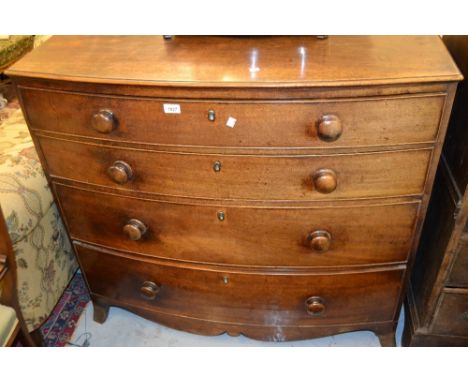 Early 19th Century mahogany bow front chest of four graduated drawers with a moulded top, knob handles and splay bracket feet