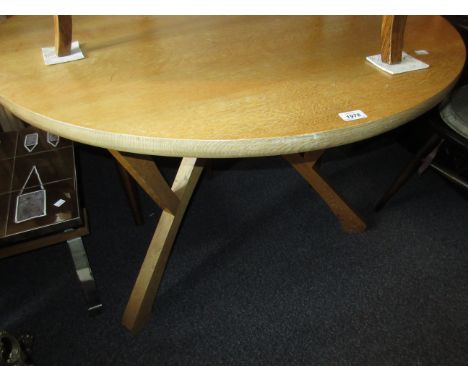 Mid to late 20th Century light oak centre table in Arts and Crafts style, on a stylised tripod base