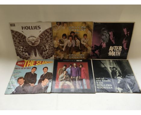 Six LPs by various artists including The Rolling Stones, The Hollies, The Searchers and The Beach Boys.