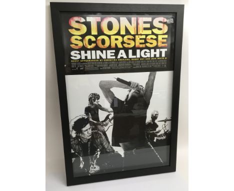 Six framed and glazed Rolling Stones posters including an advertising poster for the Martin Scorsese directed movie 'Shine A 