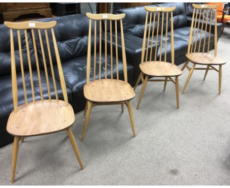 A set four light wood Ercol Goldsmiths chairs