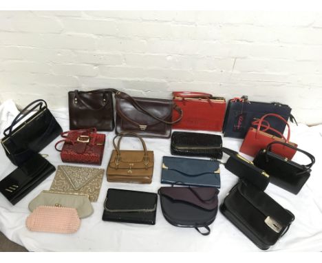 A collection of vintage bags including some leather