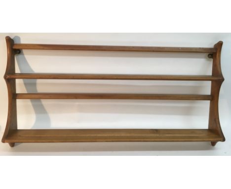 An Errol light wood plate rack.Approximately 96x49cm high