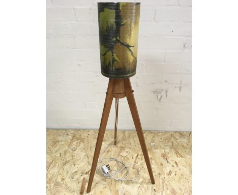 A teak tripod floor lamp with matched mottled fibreglass shade.Base Approximately 92cm