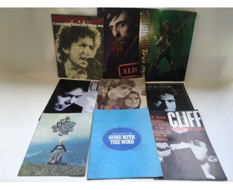 A collection of music and film programs including Alice Cooper with ticket, Small Faces, Bob Dylan with ticket and others plu