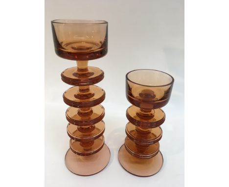 A Wedgwood glass Sheringham five ring candlestick plus a three ring example,designed by Ronald Stennet-Willson, etched marks.