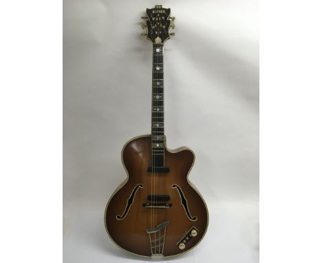 A quality vintage Hofner Commitee semi acoustic archtop guitar with f holes and mother of pearl inlays. A Bert Weedon's 'Play