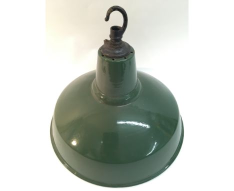 A green enamel industrial ceiling lamp.Approximately 40cm diameter 38cm high