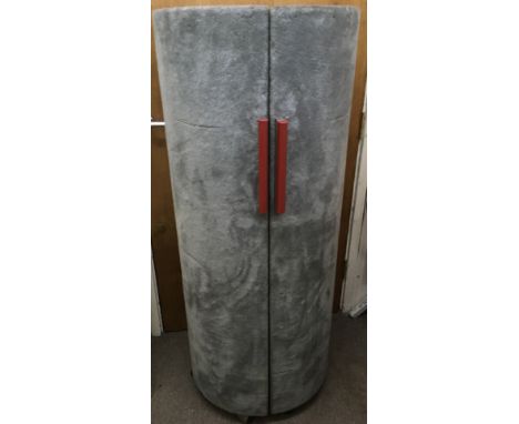 An unusual design, cylindrical fur covered vanity unit with pull open front concealing mirrored back and light up shelved int