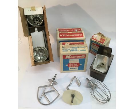 A collection of vintage boxed Kenwood Chef mixer accessories