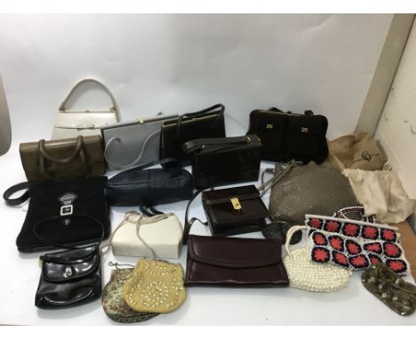 A collection of assorted vintage bags