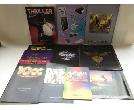 A collection of various concert programs including Queen, Michael Jackson, Bon Jovi and others.
