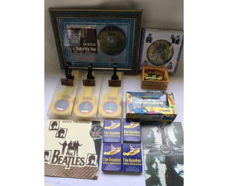 Beatles modern collectables including a framed and glazed U.K. Special edition CD containing four songs including 'Baby It's 