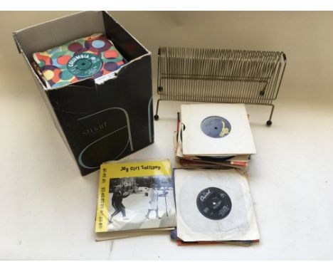 A collection of 7 inch singles by various artists including The Beach Boys, The Everly Brothers, Bobby Darin and others plus 
