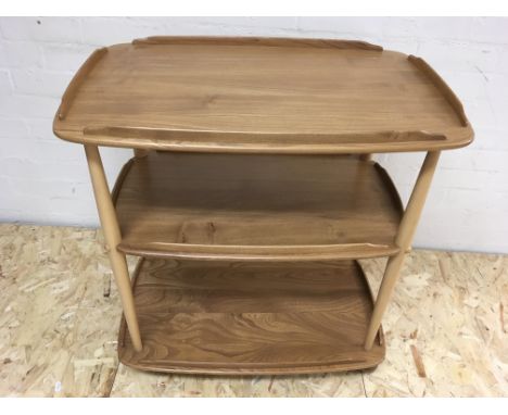 An Ercol light wood tea trolley