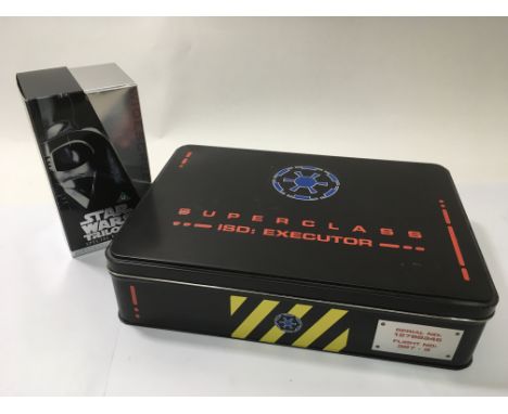 A Star Wars Superclass executor video box set and a special edition trilogy box set (2).