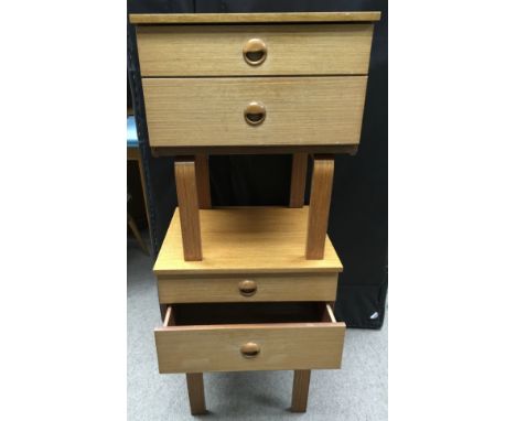 A pair of Shreiber light wood two drawer bedside cabinets.Approximately 43x50x60cm high