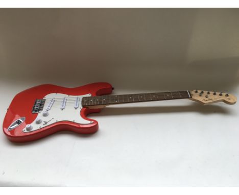 A Fender Stratocaster style guitar in fiesta red with white scratchplate.
