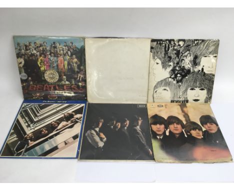 Two boxes of various LPs by various artists including a Beatles numbered 'White Album', The Rolling Stones self titled debut,